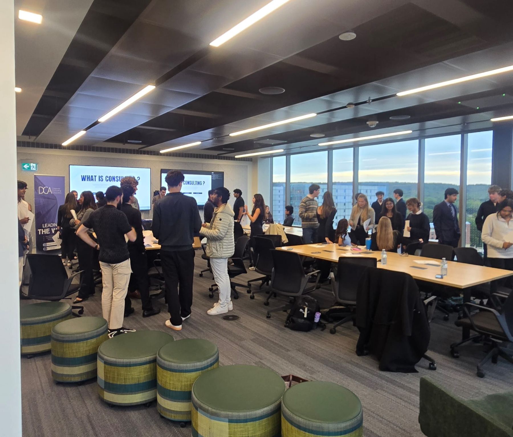 Students networking at an event in the KPMG Ignition Lab at McMaster